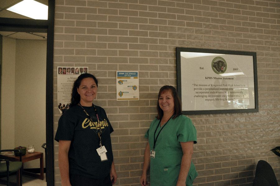 Nurse Mary Fischer and Kristin Delamer work hard to fight against the colds of flu season.