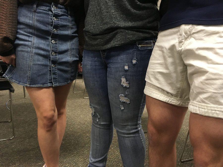 Photo of Emma Waller’s skirt, Lisette Harris’ ripped jeans, and Jacob Maple’s shorts. 