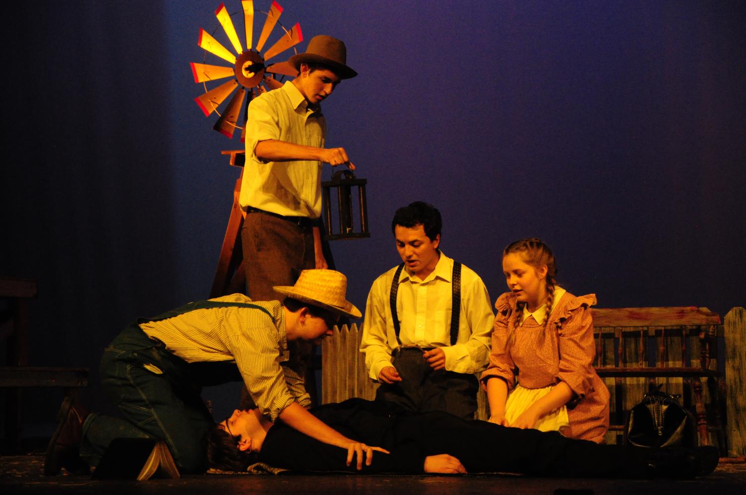 Juniors Brett Janik, Blayn Larson, Caitlin Meaux, Carson Griffing, and senior Seth Tarango rehearse a scene at the Sept. 30th dress rehearsal for