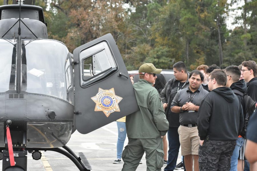 Students in teacher Scarlett Mays Criminal Justice class meet professionals after a police helicopter arrived on campus for a special event for the class.