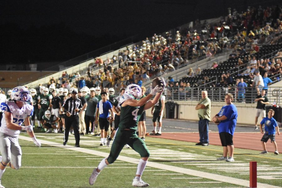 Senior Canen Adrian catches touchdown pass and scores againt Barber’s Hill on September 14th.
The Panthers eventually lost the game, 35-42. Adrian looks forward to a great season alongside his brother, Greyson.