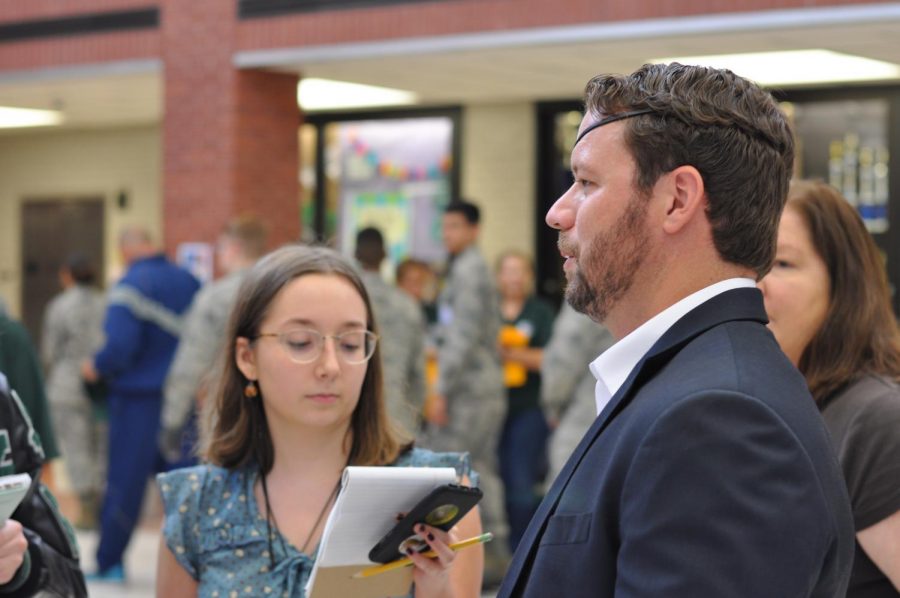 Opinion editor Blanca Cantu, senior, interviews congressman Dan Crenshaw during a visit to Kingwood Park in September.