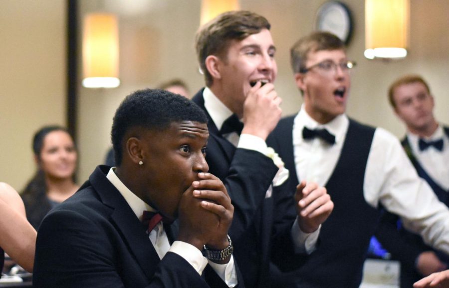 Taking a break from prom, 2019 seniors gather around to watch the NBA playoffs last May.