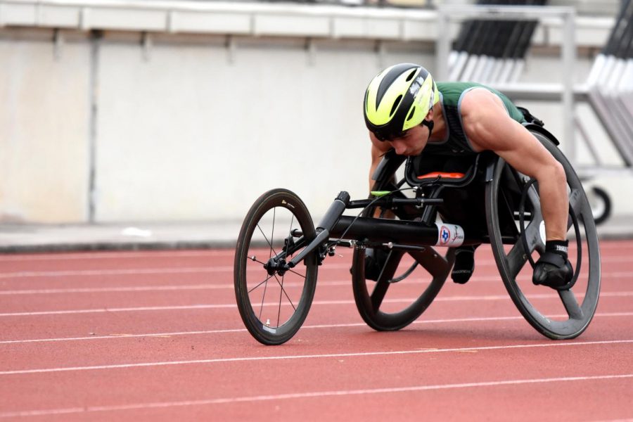 Senior Jacob Allen competes in the 400m wheelchair race on Feb. 24. While the season has been suspended, Allen has continued practicing at the Kingwood Middle track to stay in shape and prepare. He will compete at the University of Arizona next year, with his ultimate goal of competing in the 2024 Paralympic Games.