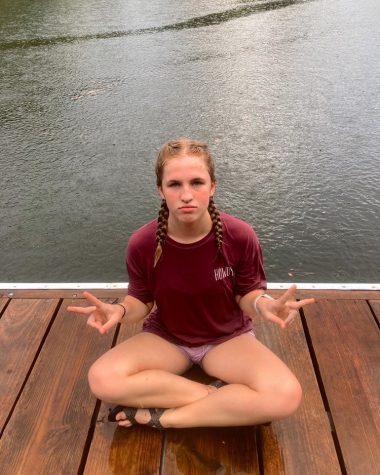 Grace Byrd hangs out near the water during church camp in the summer. She tested positive for COVID-19 soon after returning home. 