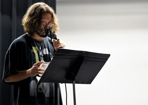 Senior Evan Janacek runs through his lines during rehearsals for the varsity theater production.