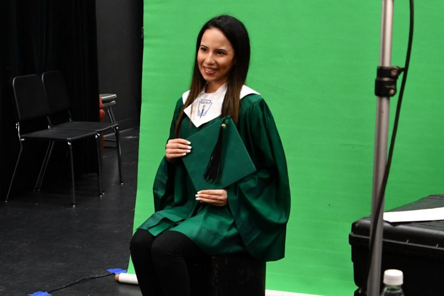 Senior Daniela Lugo Castro gets her senior photo taken for yearbook by Scott Tate Photography in September. The seniors will have their graduation ceremony outdoors at Turner Stadium. Other activities are still being discussed. 