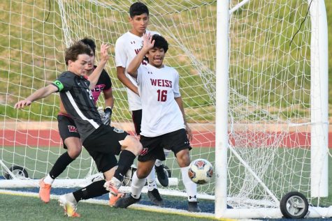 Senior Jace Banning just misses the goal in the first half of the teams second round game against Weiss on April 2.