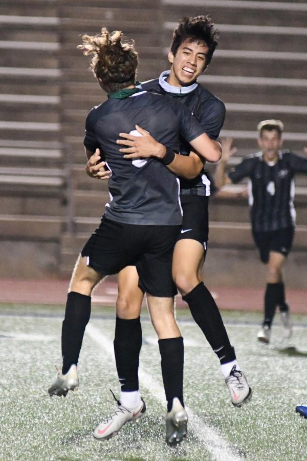 Seniors Nathan Jimerson and Jesus Cervantes celebrate after a goal against Hendrickson in the Region Final. 