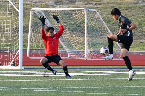 Senior Jesus Cervantes takes a shot against the Hendrickson goalkeeper to score the first goal of the game on April 9. The Panthers went on to win the Region Final, 6-2. 