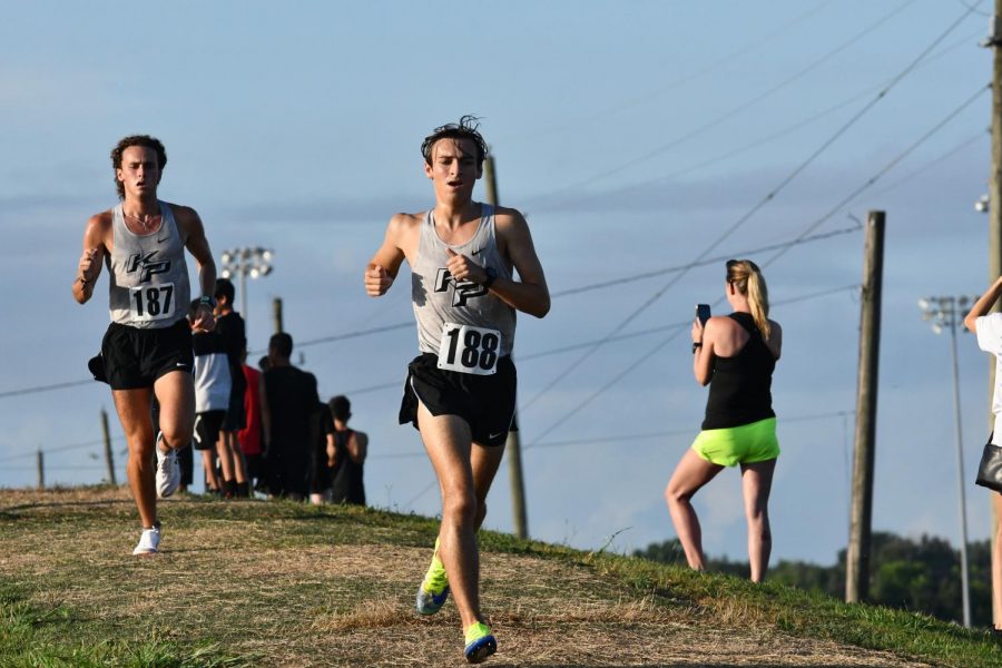 Seniors Kade Terrell and Barrett Kenny compete in the first leg of the Huffman Relays race on Aug. 14. 