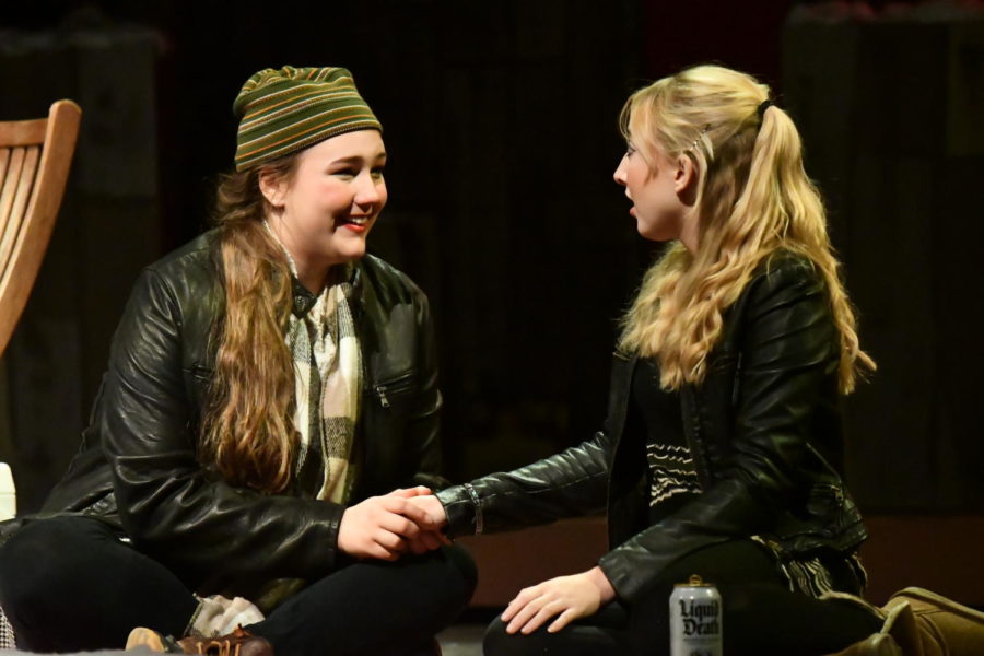 Seniors Carey Beal and Paige Heyl share a scene in Almost, Maine. The show was the first varsity performance of the year.