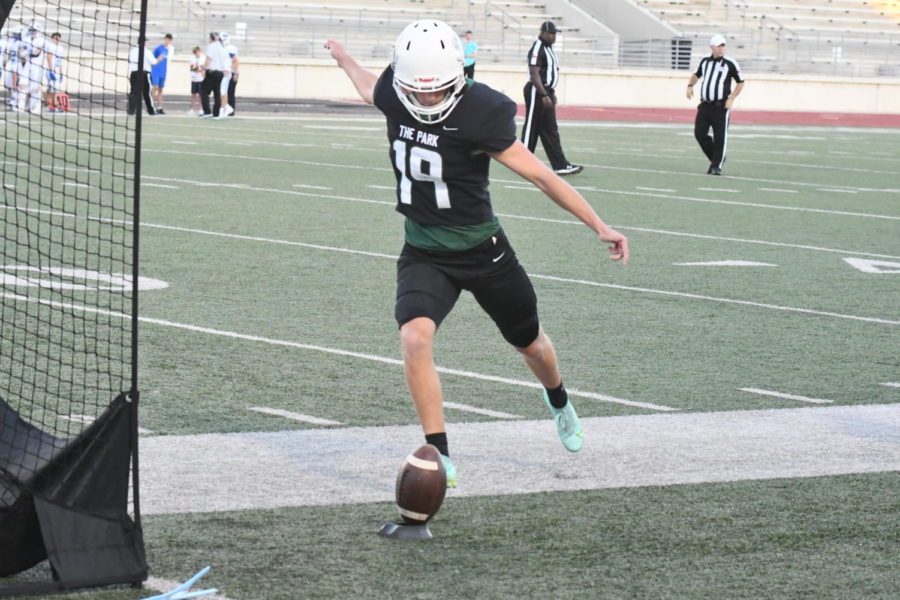 Tony Sterner practices kicking at Turner before a  varsity game against Barbers Hill.