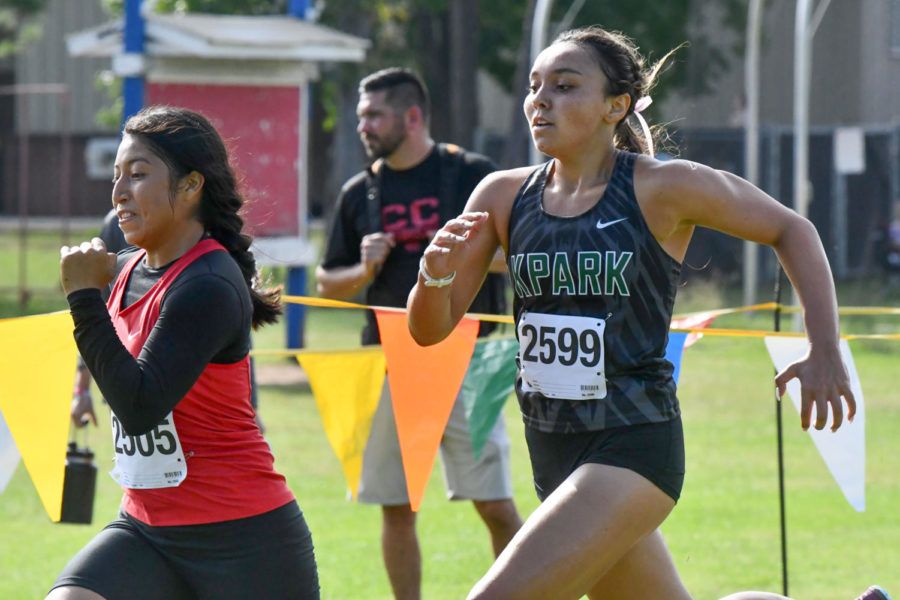 Senior Chloe Gonzales races to the finish at the district championships, where the girls team finished in 2nd. 