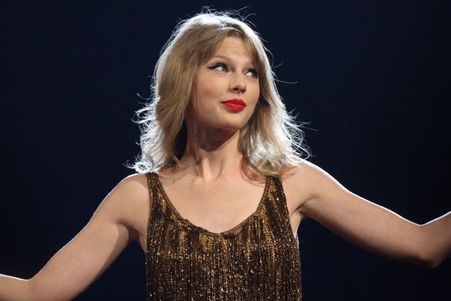 Taylor Swift performs during a tour stop. She recently re-recorded Red (Taylors Version.)
