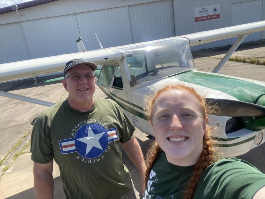 Pat+Shannon+stands+outside+of+a+Cessna+150+with+senior+Lexi+Shannon.+Pat+has+been+training+Lexi+to+earn+her+private+pilot%E2%80%99s+license.+Every+time+they+go+for+a+practice+flight%2C+they+take+a+selfie+inside+the+plane.+