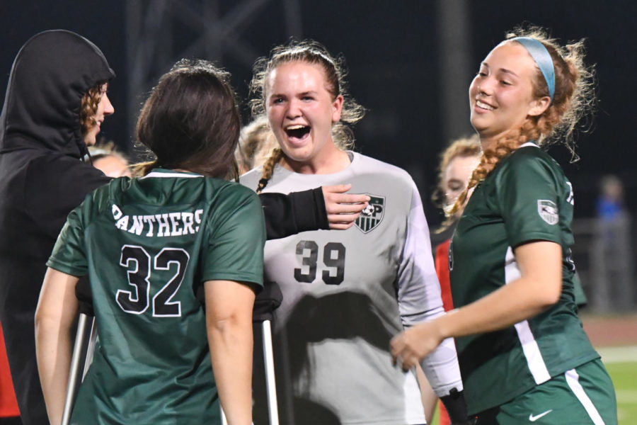 Freshman goalkeeper Courtney Daniel celebrates after the second-round victory with Kate Tiedtke, Kennedy Dolmage and Eve Hoyt. 