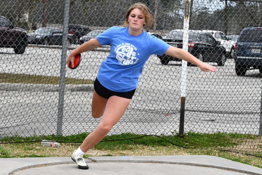 Hannah Dalby practices the discus during seventh period in March. 
