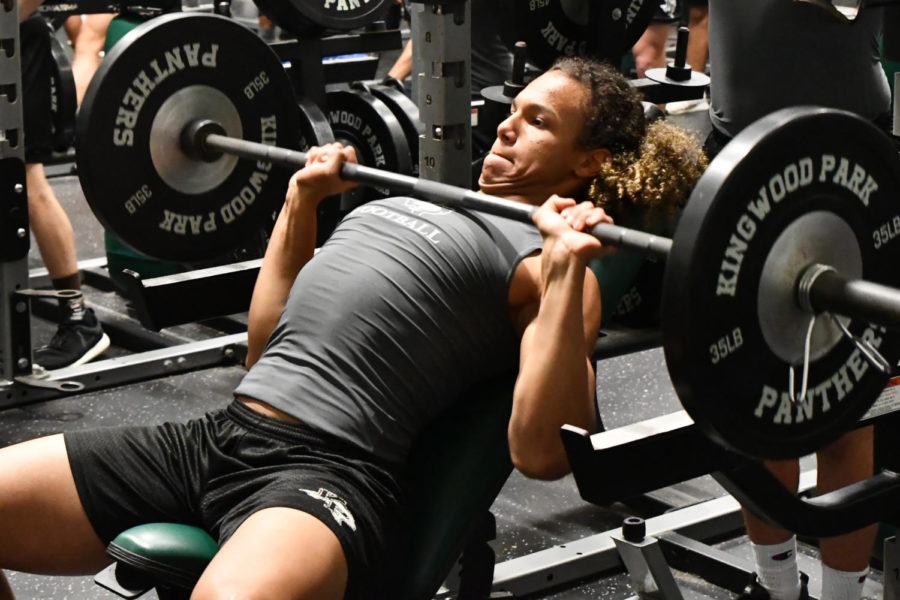 Junior+Diego+Davis+exhales+as+he+lifts+the+bar+during+incline+bench+press.+He+had+a+strong+season+at+defensive+end+and+hopes+to+see+even+better+results+as+a+senior.