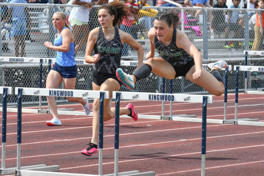 Sophomore+Eva+Abshire++competes+with+senior+Charlee+Jordan+at+a+meet+earlier+this+season.+Abshire+will+compete+in+the+100+and+300+hurdles+at+the+Regional+track+meet.