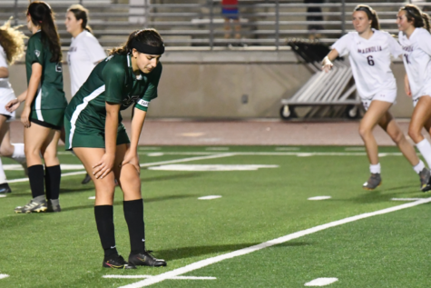 Senior Kathleen Ortiz reacts after the final buzzer sounded in the 4-0 loss against Magnolia in the Regional Quarterfinals on April 1. She was a senior captain on the team and the only senior to play on varsity all four years. 