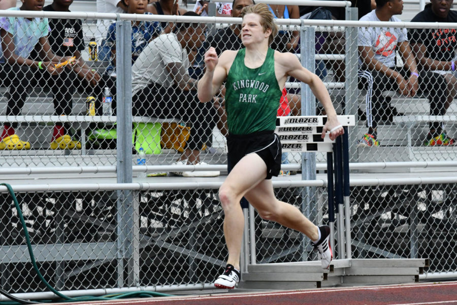 Junior Trent Burningham competes earlier this season in a meet. He has advanced in three events to the Regional track meet. 