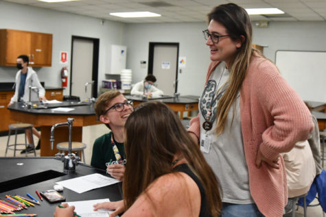 Biology teacher Danielle Steingreaber works with students during fourth period pre-AP Biology.