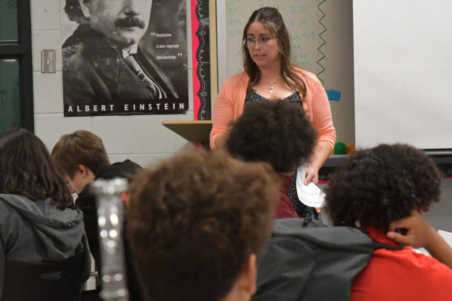 New science teachers Kellye Deauquier leads her 7th period Integrated Physics and Chemistry class.