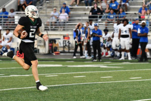 Senior Patrick Overmyer broke from the Baytown Sterling defense to score in the homecoming football game on Sept. 16. He led the team to a 44-0 victory.