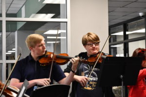 Seniors Joseph Weidemann and Ethan Otte perform at school in September with some classmates. Weidemann is part of the Regional Orchestra performing tonight.  