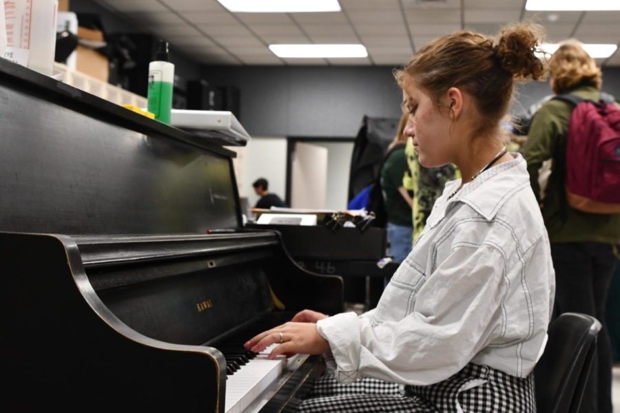 Freshman Abigail Nieto plays the piano in the band room. She started playing when she was only 6 years old.