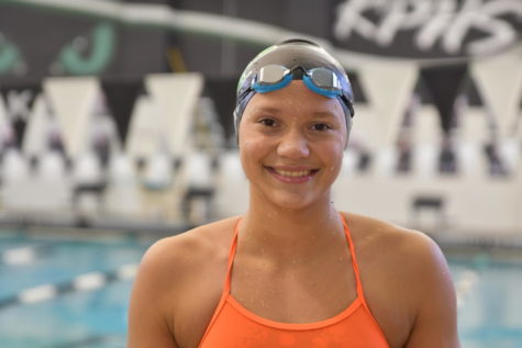 Freshman swimmer Elena Amos has already made an impact on the swim team, breaking the school record in the 50 free and the 100 fly. She also swims for Blue Tide Aquatics and hopes to someday represent El Salvador in the Olympic Games.