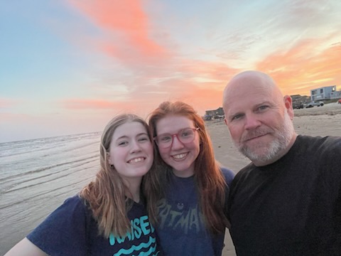 Senior Sara Snyder takes a selfie with her sister and dad. 