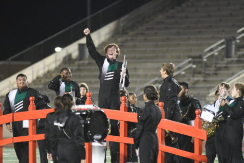 Senior Connor Langdon cheers as his bandmates surprise him by singing him Happy Birthday at the end of their performance after the Baytown Sterling game on Sept. 16. 