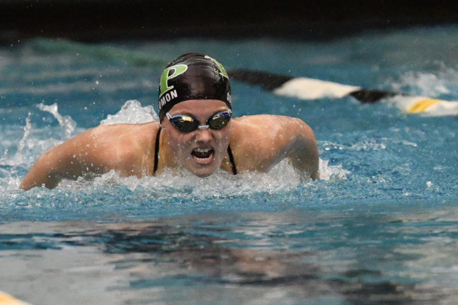 Senior Carlie Solomon competes in the butterfly on Senior Night in January. She is a four-time state qualifier and will compete in the State Championships on Friday and Saturday.