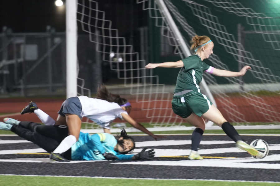 Senior+Emma+Yeager+got+past+a+defender+and+the+goalkeeper+to+score+in+the+second+half+of+a+5-0+victory+against+Lufkin+on+Feb.+14.+The+goal+was+the+108th+of+her+career+and+her+second+one+in+the+game.+She+surpassed+the+all-time+scoring+record%2C+which+was+previously+106.