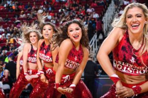 Former Silver Star Kaitlyn Gonzalez (second from right) dances with her teammates at the Houston Rockets vs Los Angeles Clippers game earlier this season.