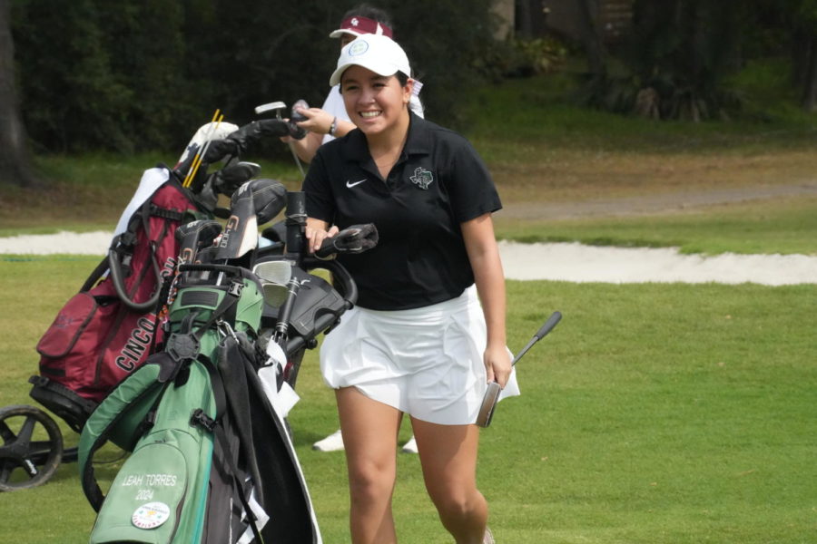 Junior Leah Torres prepares to move onto the next hole during a tournament at Kingwood Country Club on March 11.