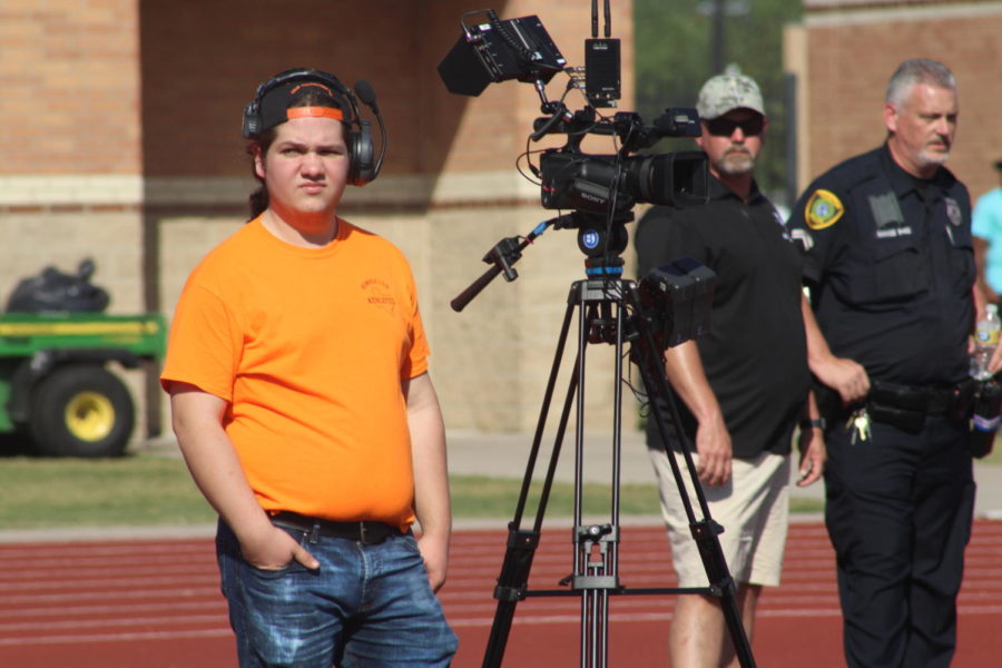 Junior Liam Longo works on the cameras at Turner Stadium during the Baytown Lee football game on Oc. 15. 