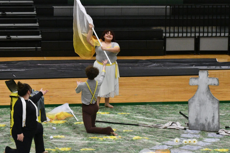 The color guard performed a preview of their show for the community before they went to the area competition. 