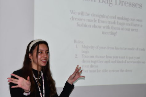 Freshman Sarah Orth leads a meeting of Fashion Club in January.