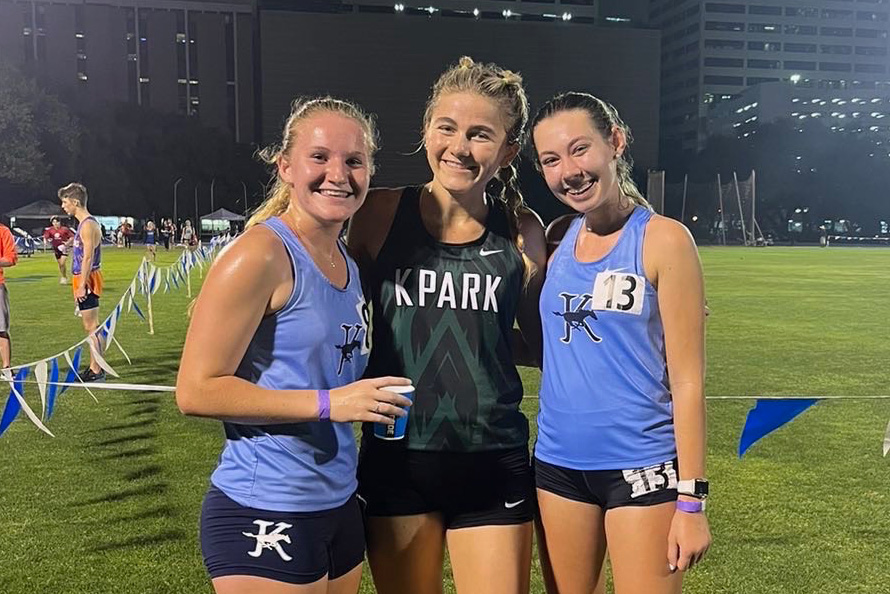 After her first steeplechase event, sophomore Lucy Foltz poses with two of her friends from Kingwood High School who also competed. 