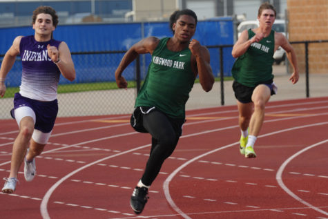 Senior Tyrique Riley competes in the 200 meter dash at the Barbers Hill Meet. He helped lead the 4x200 team to the Area Meet in his first track season.