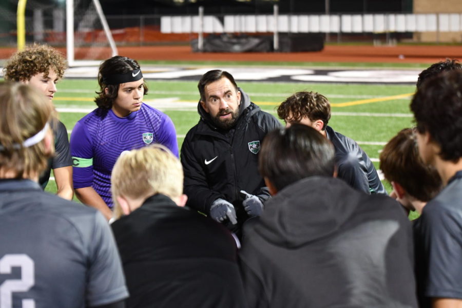 Coach Boehm rallies the team for a final push against Dayton. 