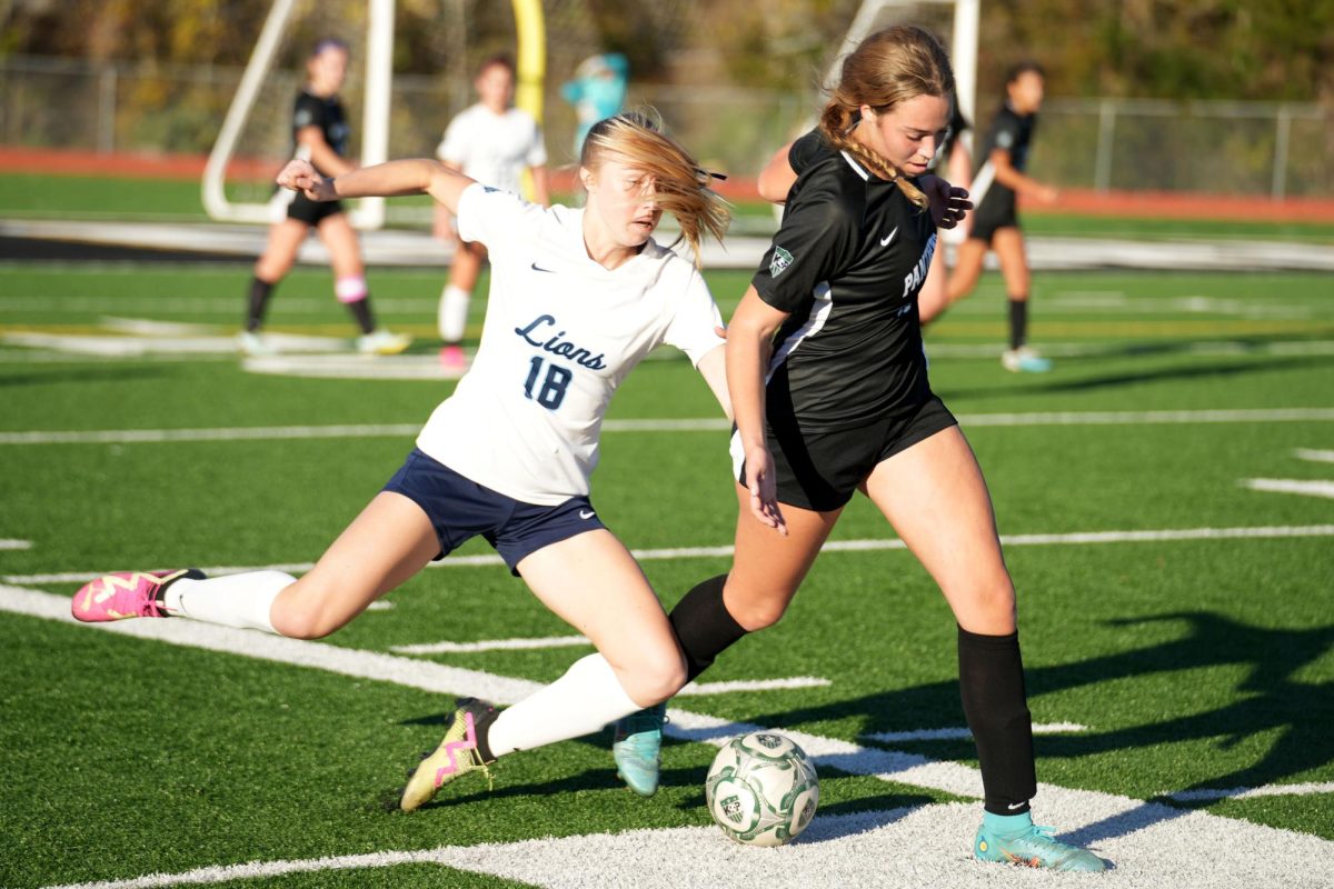 Senior midfielder Eve Hoyt pushes up the line against Lake Creek during the scrimmage on Dec. 16.
