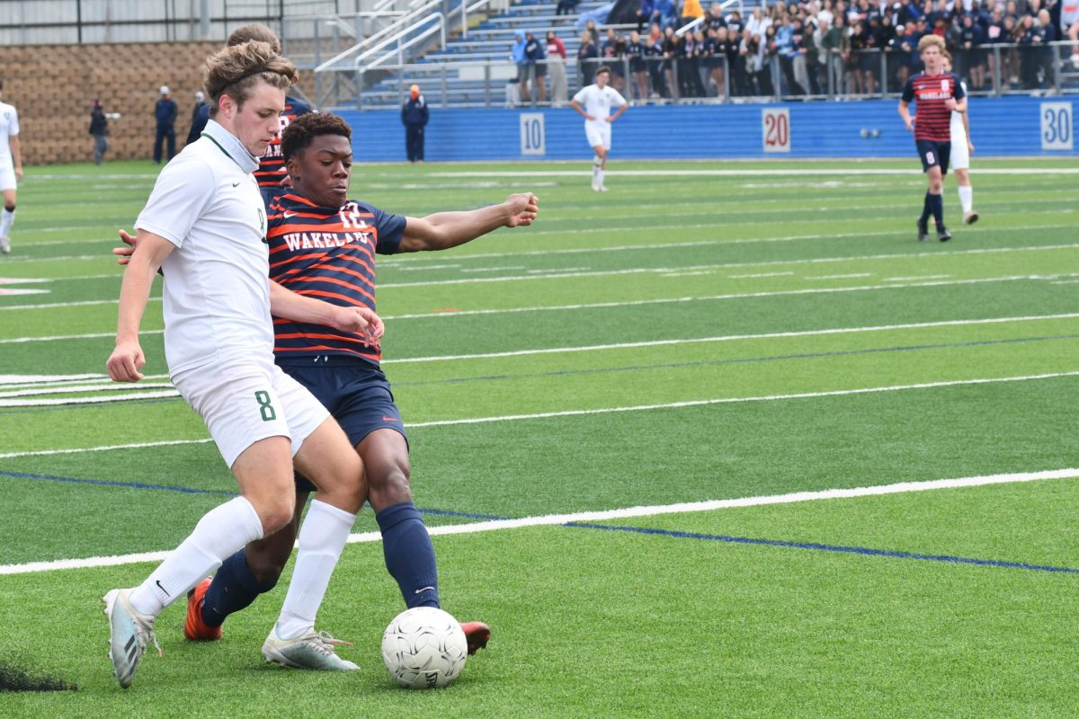 Senior Nathan Jimerson beats a defender to the ball against Frisco Wakeland in the 2021 boys state soccer championship game at Georgetown High School. The Panthers lost, 3-2.