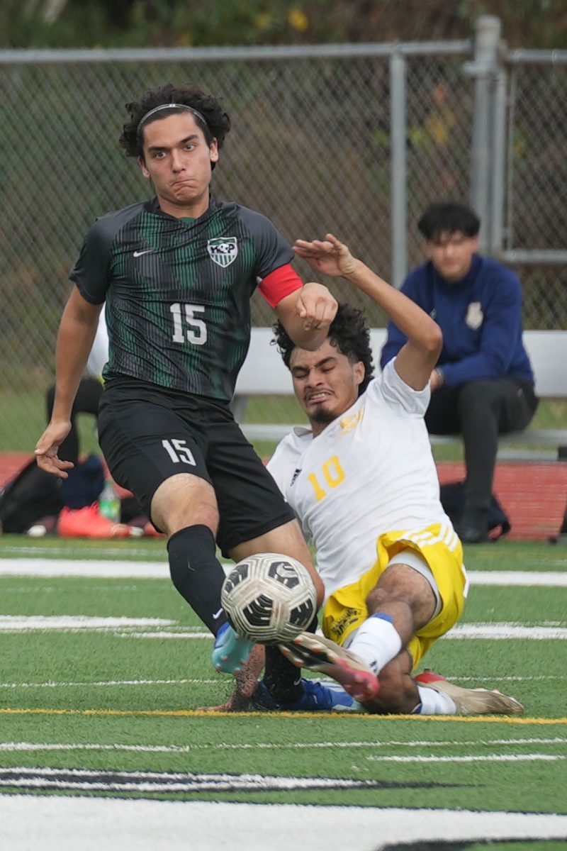 Senior defender Luke Cavallo collides with a Nimitz player as they fight for a ball in the second half of the game against Nimitz on Dec. 9. 