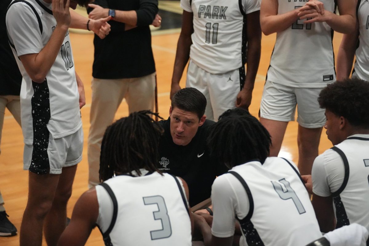 Coach Jeffrey Hamilton talks to his team during a timeout against Magnolia West in December. He said the new realignment should give the Panthers a chance to contend for a district title next year. 