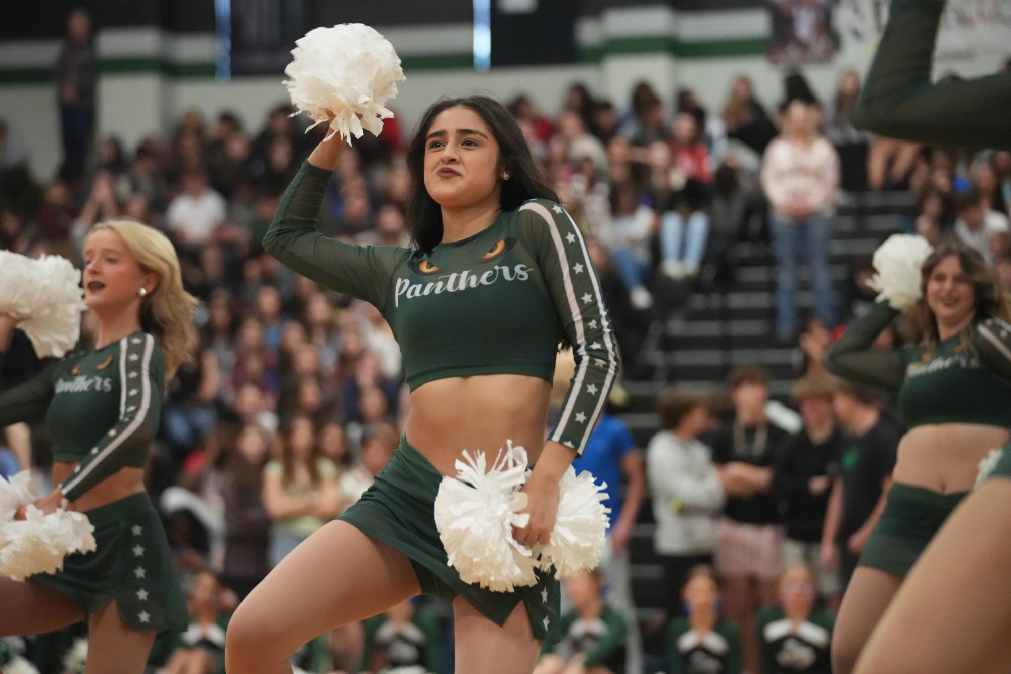 Junior Gracie Hernandez dances with the All Stars at pep rally.