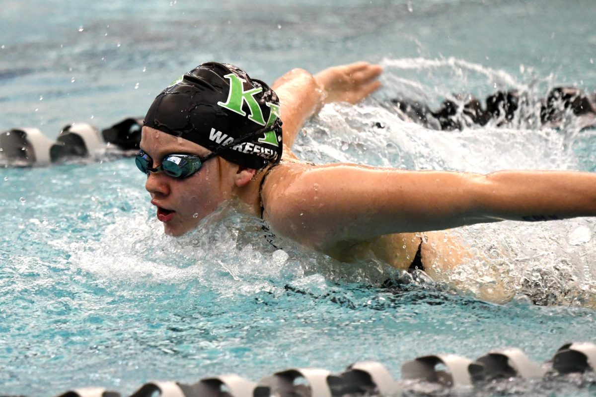 Freshman Marie Wakefield swims the butterfly during the Senior Night Meet earlier this month. She is one of four freshmen who advanced to the Region Swim Meet next week.